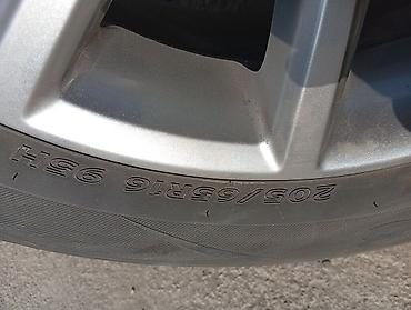 sonata y20: Литой диск Hyundai с шиной Hankook - Оригинальный литой диск Hyundai — 4