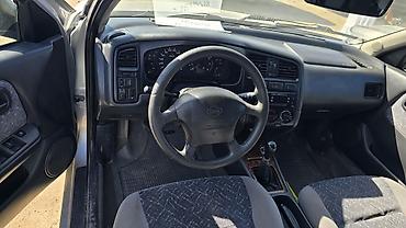 оптика 124: Nissan Primera: 1998 г., 1.8 л, Механика, Бензин, Седан — 6