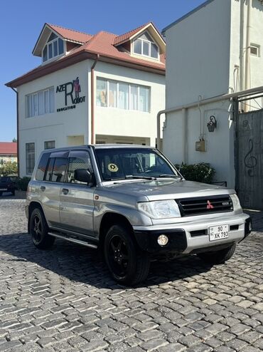 Кастрюли: Mitsubishi Pajero iO (5 qapı) SUV - Kuzov: kompakt 4x4 SUV, gümüşü