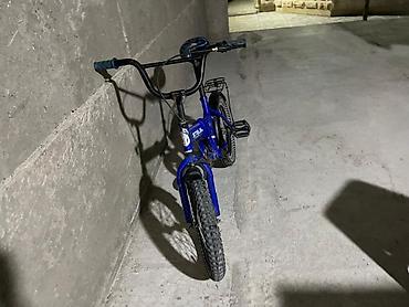 irsad telecom velosiped: Mavi rəngli BMX tipli velosiped. Kompakt ölçülü çərçivəyə malikdir və — 1