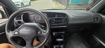 дейхатсу куоре: Daihatsu Cuore: 2003 г., 1 л, Автомат, Бензин, Хэтчбэк — 5