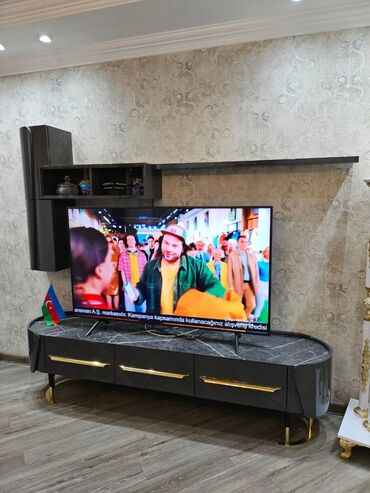 Gəzinti arabaları: Tv stend tecili satilir 500azn. Yagmur mebelden alinib. Unvan kesle m