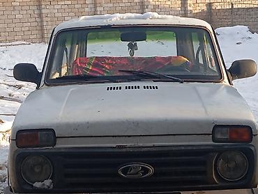 opel zafira b: Lada Niva 4x4, ağ rəngli, Xüsusiyyətlər: - Tam ötürücü (4x4) — 1