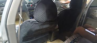 rolls royce silver ghost: Седан бизнес‑класса, серебристый, 4 двери. Просторный салон с тканевой — 7