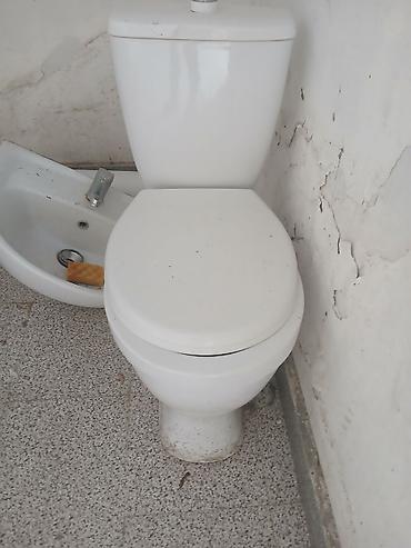 islenmis unitaz: Sərlikli su qovlu WC komplekti - Kafel üçün uyğun, döşəməyə — 1