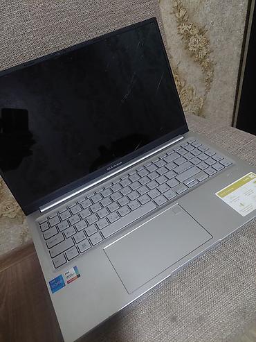 ekrani sinib: ASUS Vivobook noutbuku Xüsusiyyətlər və imkanlar: - Prosessor: Intel — 4