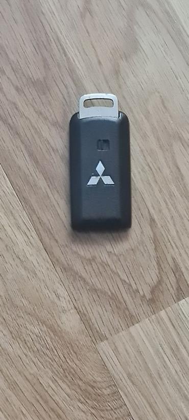 masin acarlari: Mitsubishi avtomobilləri üçün orijinal smart açar (3 düyməli) — 1