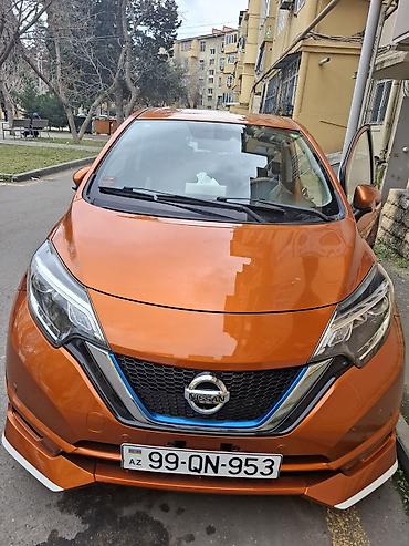 генератор фольксваген: Nissan Note e-POWER, narıncı rəngli, şəhər üçün ideal hibrid (benzin — 2