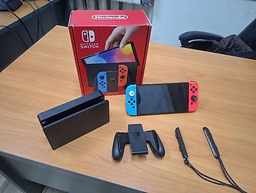 Nintendo Switch OLED: Продаю прошитую приставку нинтендо свитч олед, в связи срочной — 10