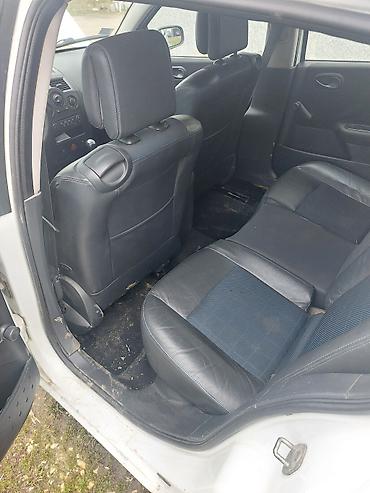 Renault: Renault Mégane II, bele boje, hečbek sa 5 vrata. Pogonsko rešenje sa — 13