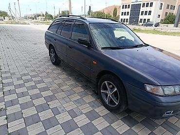 385 55: Mazda Capella: 1999 г., 2 л, Механика, Бензин, Универсал — 1