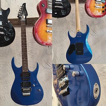 Gitaralar: Elektro-gitara Smiger S-G5 BL Simlərin sayı: 6 Üst: Cökə ağacı Qol — 1