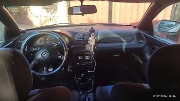 мини электро: Mazda 323: 1996 г., 1.6 л, Механика, Бензин, Хэтчбэк — 7
