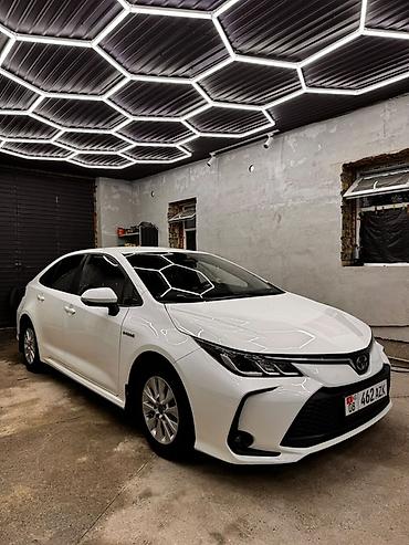 byd ev: Toyota Corolla: 2024 г., 1.8 л, Вариатор, Гибрид, Седан — 2