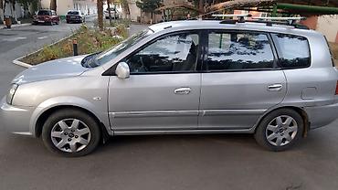 ford focus 2000: Kia Carens: 2 l | 2003 il Van/Minivan — 1