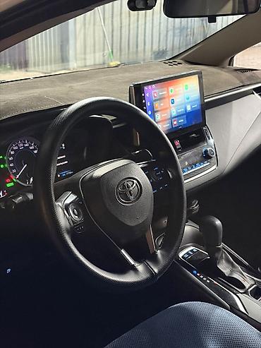 Toyota: Toyota Corolla: 2019 г., Гибрид, Седан — 11