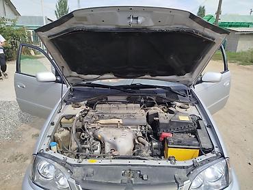 merc w210: Toyota Avensis: 2003 г., Бензин — 7