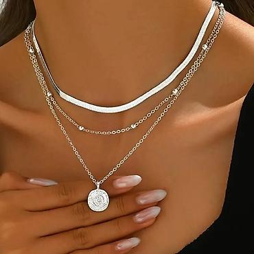 guess rsd: Ženska ogrlica – set u srebrnoj boji 🛒1,400 dinara - Materijal — 1