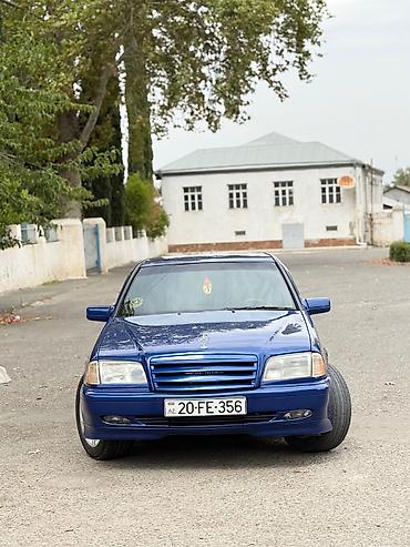 car parking maşın satışı: Mercedes-Benz C-Sinif sedan (W202) — mavi rəng, 4 qapı. Xüsusiyyətlər — 1