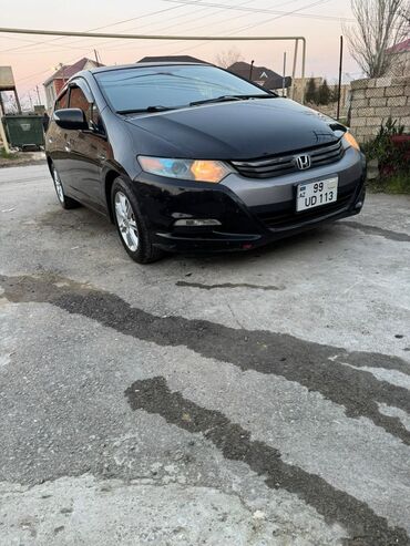 07 sekilleri peredok: Honda Insight: 1.5 l | 2010 il Hetçbek