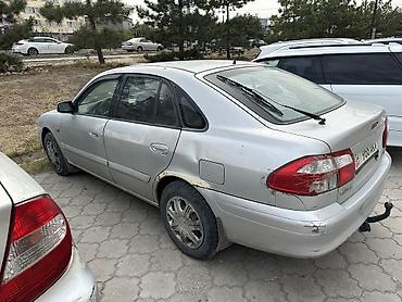 Унаа: Mazda 626: 2001 г., 2 л, Кол менен иштөөчү, Бензин, Седан — 4