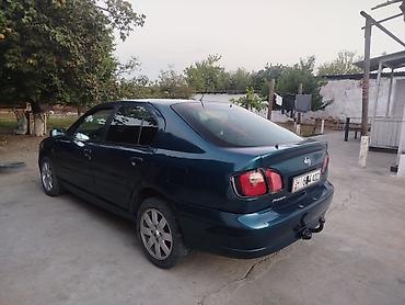 тунуке бу: Nissan Primera: 2001 г., 2 л, Кол менен иштөөчү, Бензин, Седан — 3