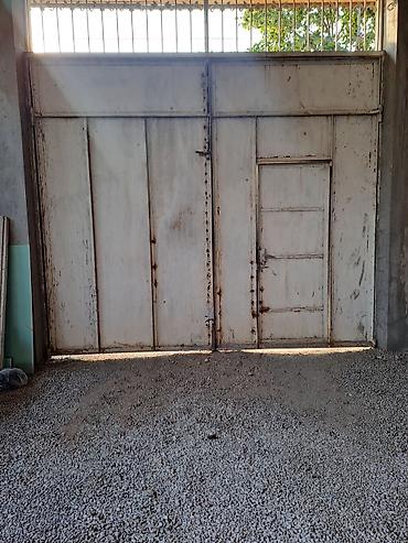 qaraj qapı: Metal darvaz - Material: qalın metal təbəqələr və profil karkas - — 1