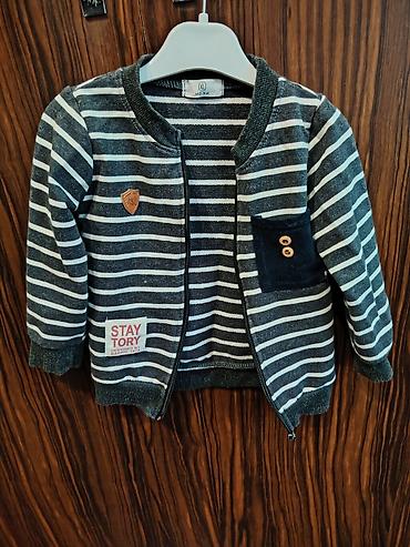 Üst geyimləri: Uşaq sviteri/jemper-jaket - Model: xətlərlə naxışlı, ön hissəsi — 1