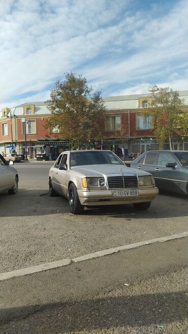 Mercedes-Benz: Mercedes-Benz 230: 2.3 l | 1990 il Sedan — 2