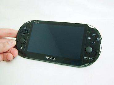 wifi modemi: Model: PS Vita Slim (2000 serija) Uz konzolu dolazi: Kabl za — 9