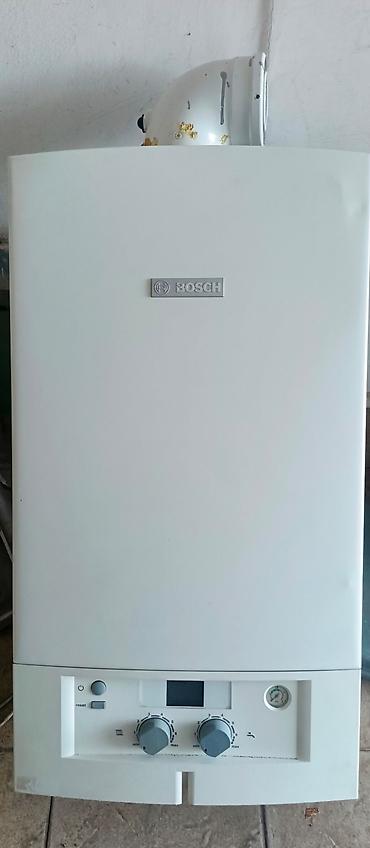 Kombi Bosch 28 kw Almania istehsalı 28 kw Kombiye servis tərəfindən 1