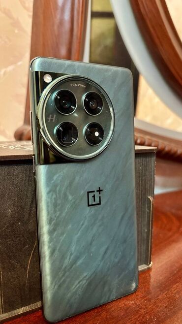 islenmis telfonlar: OnePlus 12, 512 GB, rəng - Yaşıl, Barmaq izi, Simsiz şarj, İki sim kartlı