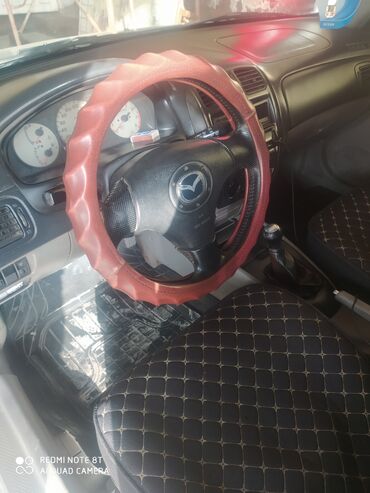 Mazda: Mazda 323: 2003 г., 1.6 л, Механика, Хэтчбэк — 4