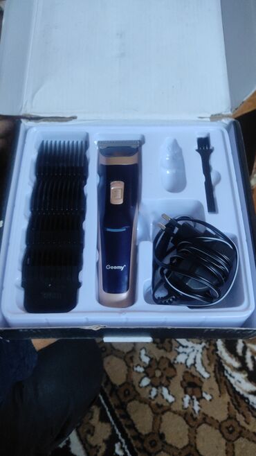 чесальная машина: Машинка для стрижки волос