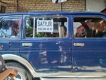 lada diskləri: LADA Niva 4x4, mavi rəng, 5 qapılı universal kuzov. Xüsusiyyətlər: - — 3