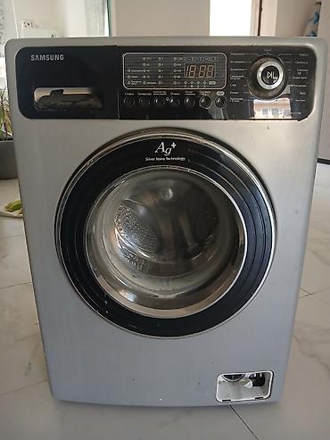 samsung 1200: Samsung paltaryuyan maşın, ön yükləməli modeldir. Korpus gümüşü — 1