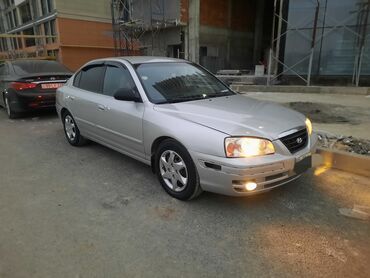 Hyundai: Hyundai Elantra: 1.6 l | 2004 il Sedan — 1