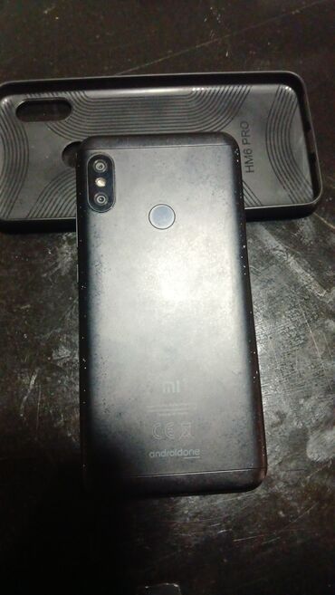 telefon üçün: Xiaomi Mi A2 Lite, 4 GB, rəng - Qara, 
 Barmaq izi, İki sim kartlı