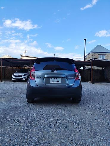 Nissan: Nissan Note Medalist (JDM), boz rəng, hatchback gövdə. Texniki — 15