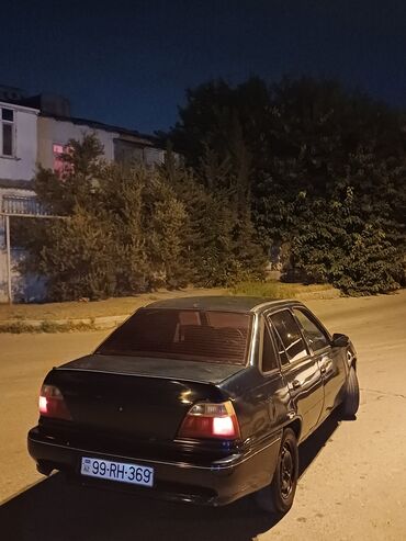 qaz 29: Daewoo Nexia: 1.5 l | 1998 il Sedan