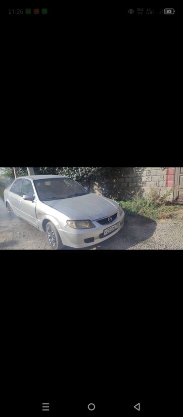 Mazda: Mazda 323: 2000 г., 1.6 л, Механика, Бензин, Седан