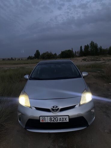 сколько стоит электро машина: Toyota Prius, гибридный хэтчбек, серебристый цвет кузова. 2014 года