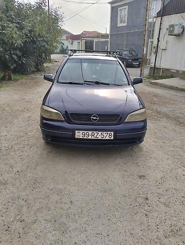 prius baqaj: Opel Astra Caravan (universal) – tünd mavi rəng. Xüsusiyyətlər: - — 7