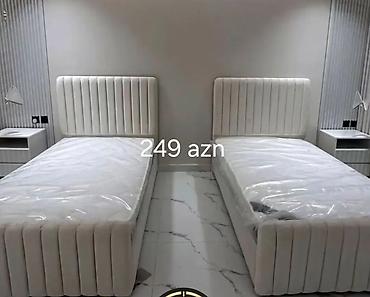 matras tək: - Tək nəfərlik yumşaq başlıqlı çarpayı - Rəng: açıq krem/ağ - Dizayn — 1
