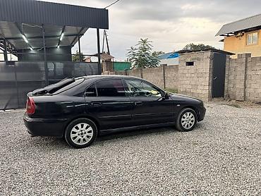 Транспорт: Mitsubishi Carisma: 2003 г., 1.6 л, Механика, Бензин, Лифтбек — 9