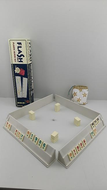 Oyun dəstləri: FLASH Plastic Rummy Set – stolüstü oyun dəsti Məhsulun tərkibi: - 4 — 1
