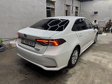 outback 2005: Toyota Corolla: 2024 г., 1.8 л, Вариатор, Гибрид, Седан — 5