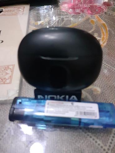 Qulaqcıqlar: Nokia TWS simsiz qulaqlıq - Dizayn: Qara rəngli kompakt şarj qutusu — 1