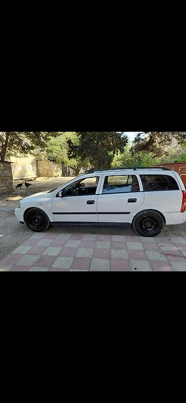 opel difuzer: Opel Astra Universal – ağ rəng Xüsusiyyətlər: - Kuzov: universal — 3