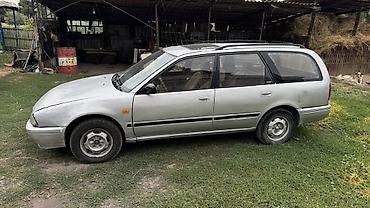 Транспорт: Nissan Primera: 1992 г., 2 л, Механика, Бензин, Универсал — 4